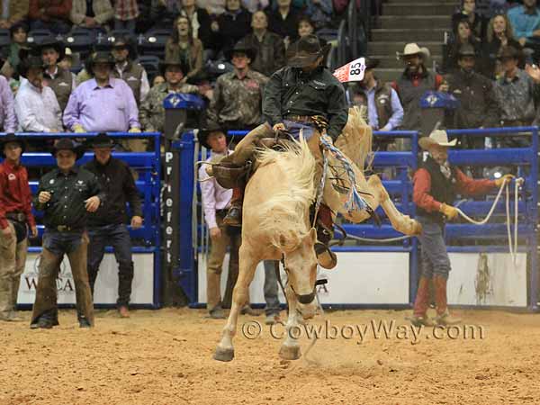 Kyle McCord in the ranch bronc riding