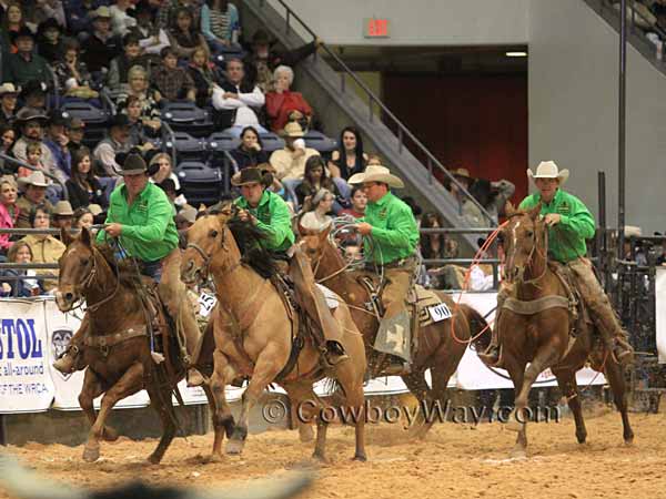 A ranch rodeo team pursues their steers
