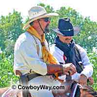 Cowboy wild rags on cowboy mounted action shooters