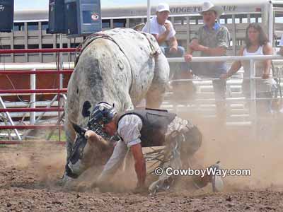 Bull riding helmet on a fallen bull rider