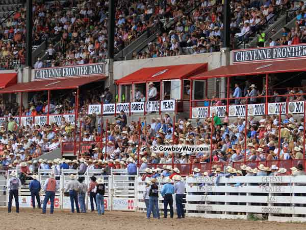 The crowd at the Cheyenne Frontier Days Rodeo watches the bull riding