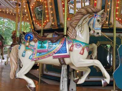 A full size wooden carousel horse