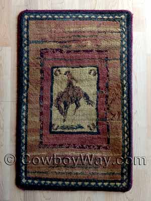 An area rug with a cowboy and Western design