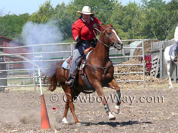 Both men and women compete in Cowboy Mounted Shooting