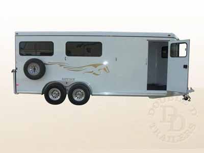 A bumper pull D & D slant load horse trailer