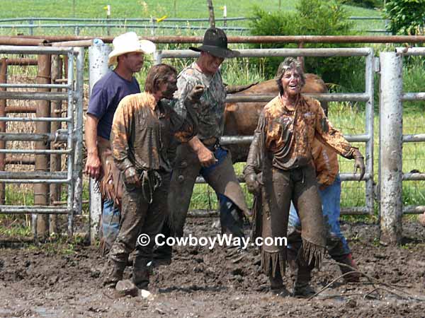Cowgirls covered in mud