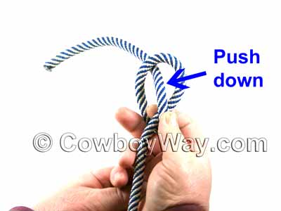 Push down the top of the knot