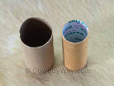 A cardboard toilet paper roll and Vetrap roll